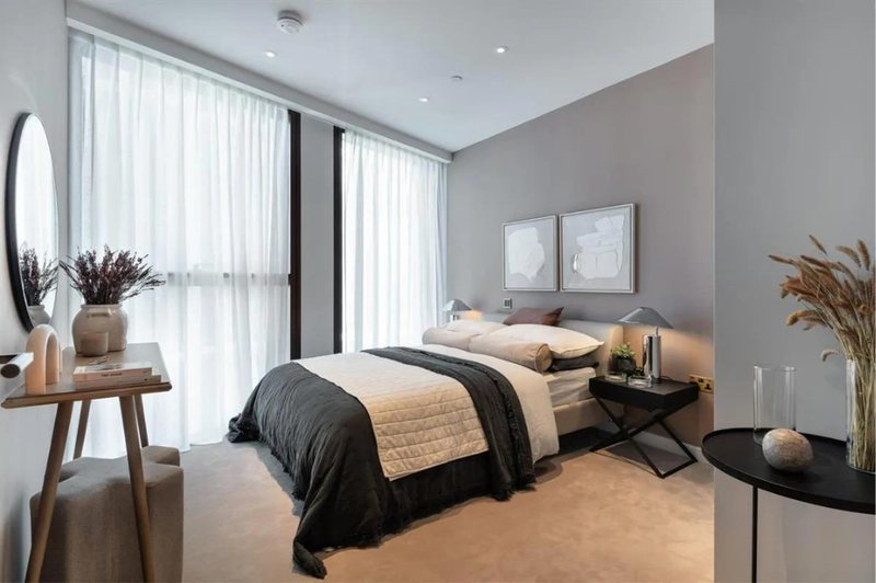 Bedroom with dark bedspread