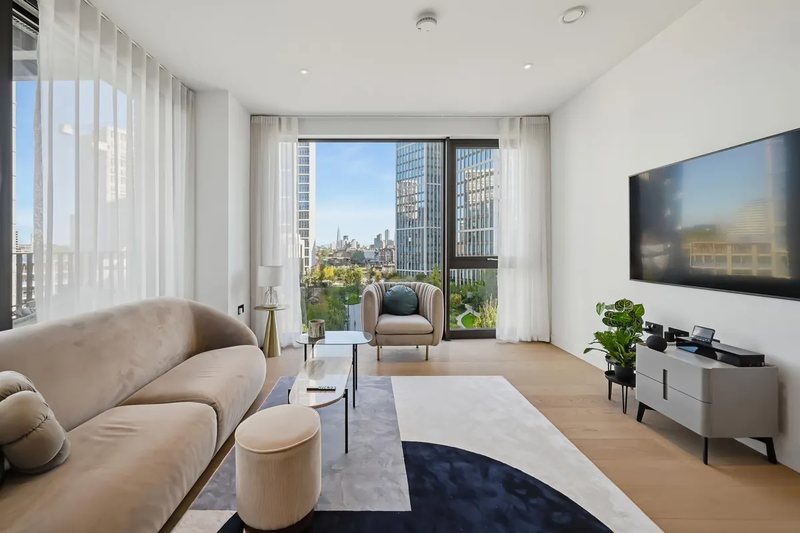 Living area with curved sofa