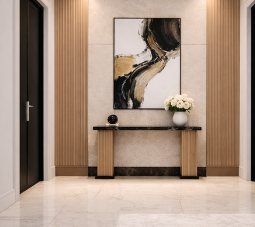 Entrance hall with a marble floor, timber-slatted wall panels and a console table